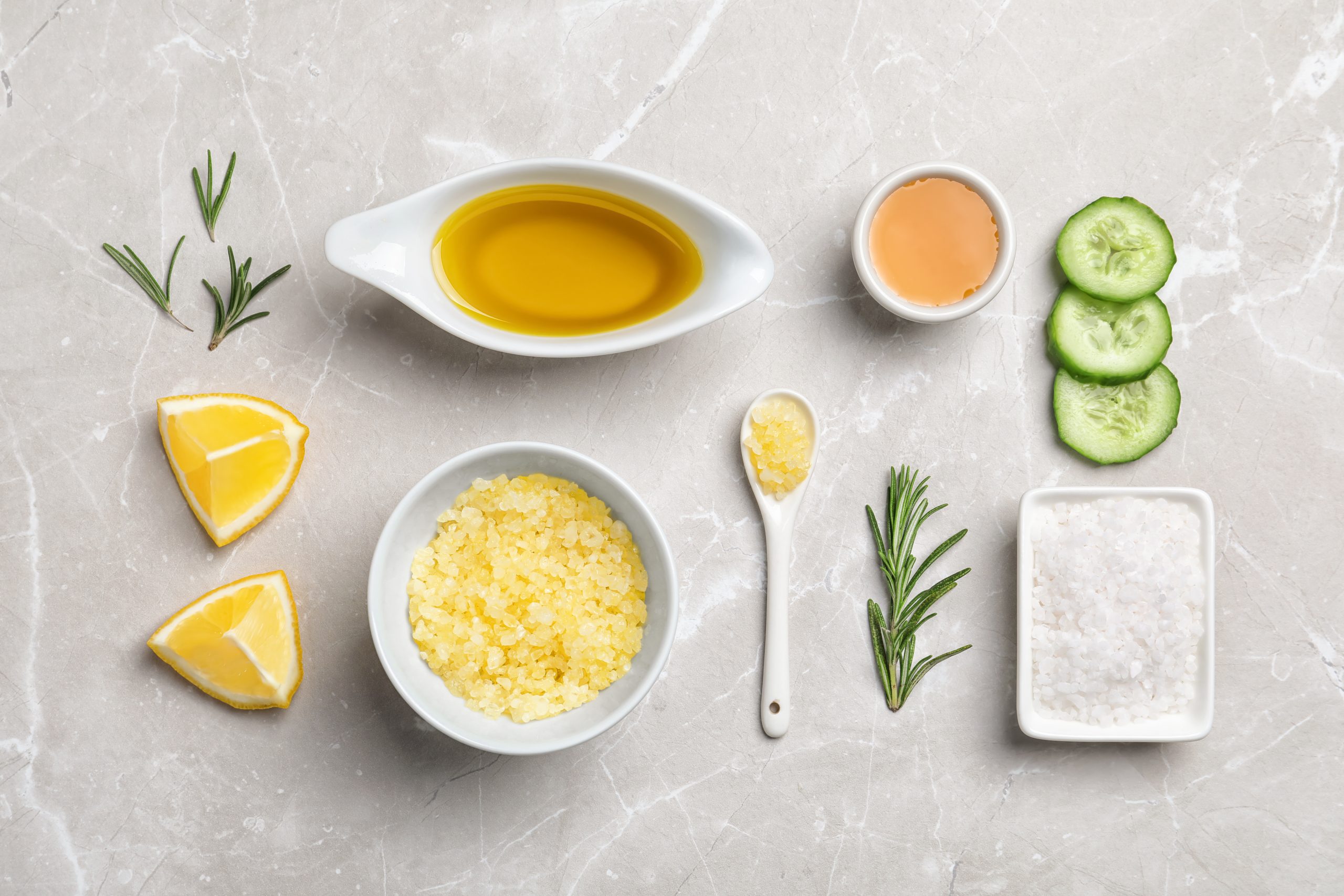 Natural oils for skincare routine arranged in earthy tones