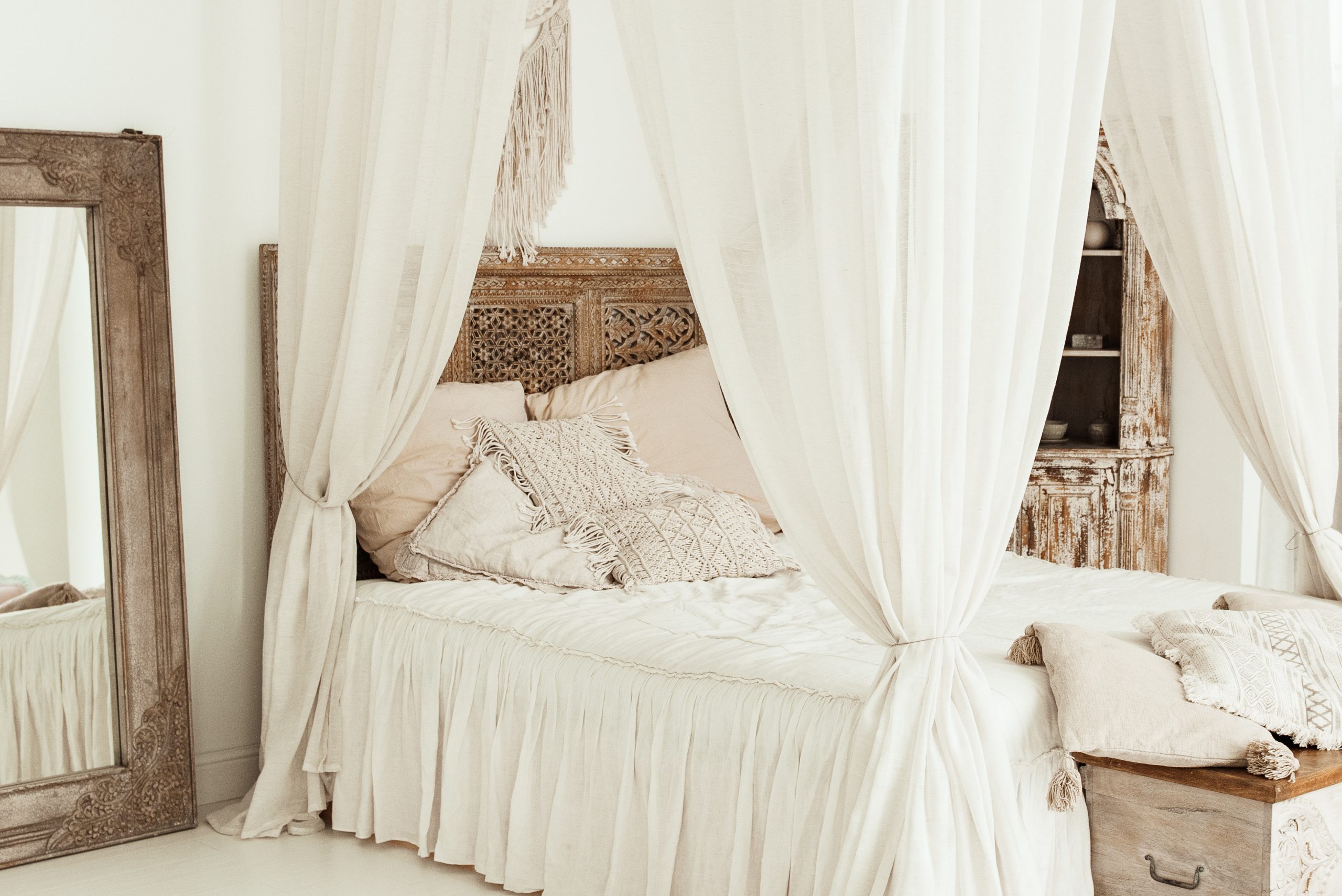 Farmhouse bedroom with beautiful linen curtains jute rug